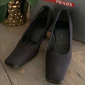 Black fabric Prada pumps